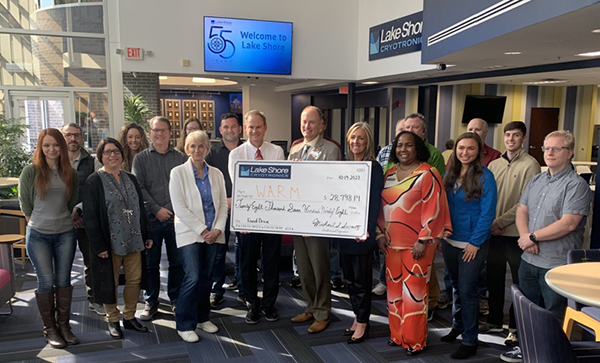 Lake Shore presents a check to WARM